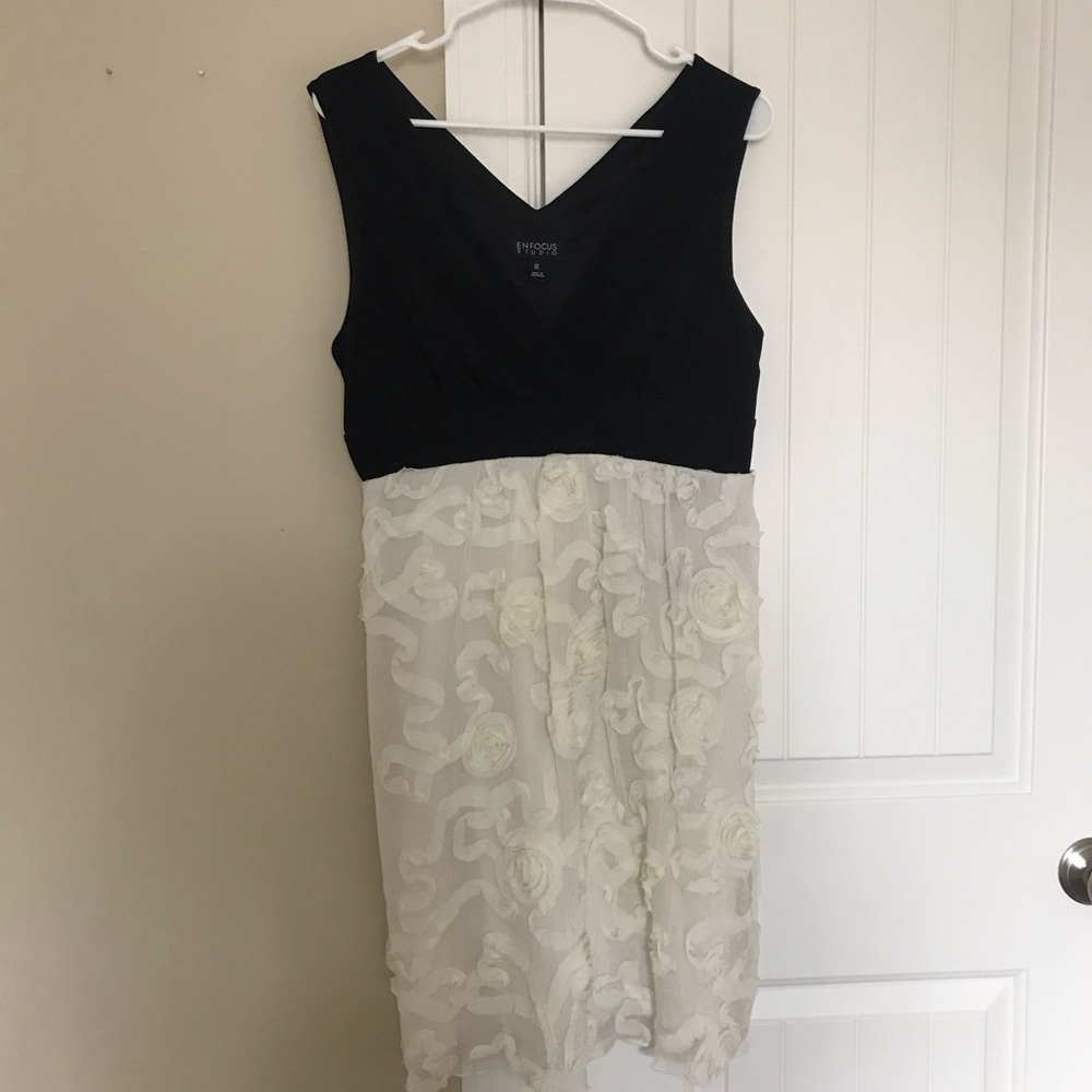 Black sleeveless low cut dress size 12